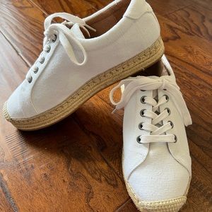 Quintessential summer canvas shoes with soft buttery leather insoles.